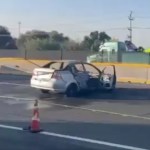 Abandonan auto con cuerpos calcinados en la autopista México-Puebla