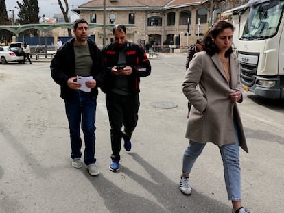 Mahmud Muna (left) with his brother Morad and his wife, May, after his release from prison, before being placed under house arrest.