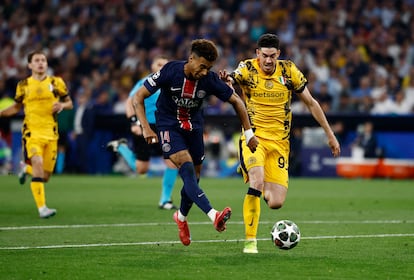 Soccer Football - Champions League - Final - Paris St Germain v Inter Milan - Allianz Arena, Munich, Germany - May 31, 2025
Paris St Germain's Desire Doue scores their third goal REUTERS/Stephanie Lecocq